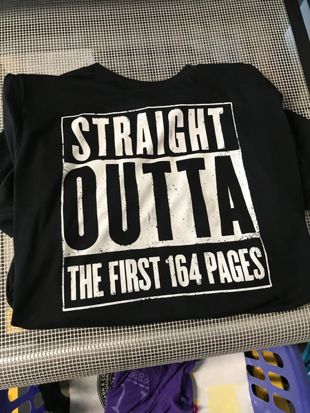 Black T shirt  with White Ink. Recovery based text saying "Straight out of the first 164 pages. The  first 164 is a reference to the Big Book of Alcoholics Anonymous